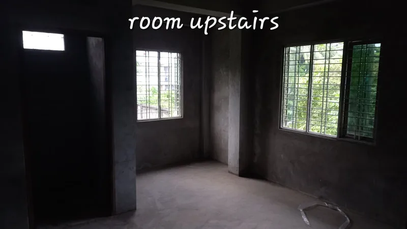 Upstairs room with plastered walls