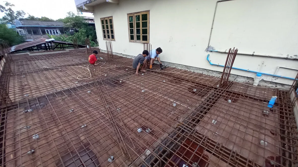 Steel reinforcement beside an existing building