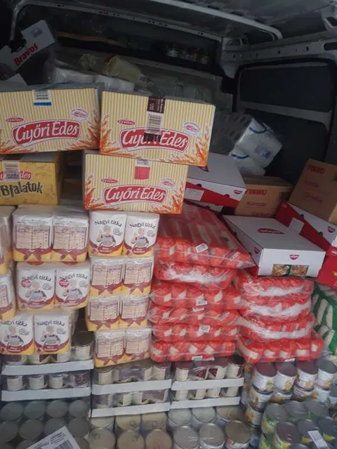 Van filled with packaged food supplies