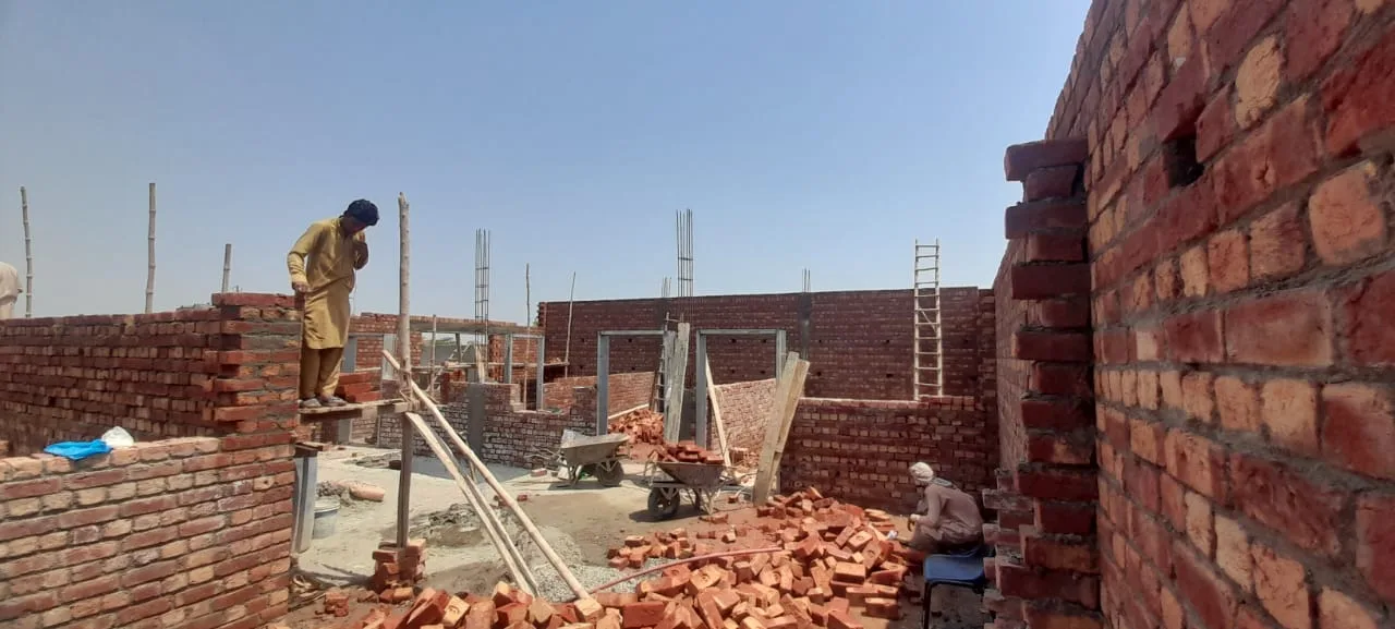 Brick structure with temporary wooden supports