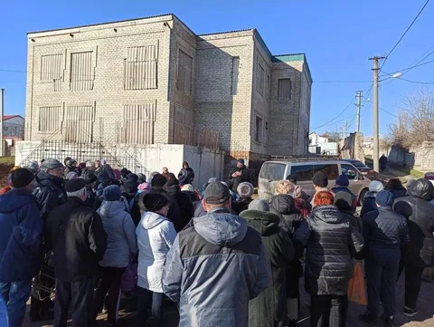 Crowd gathered outside a building