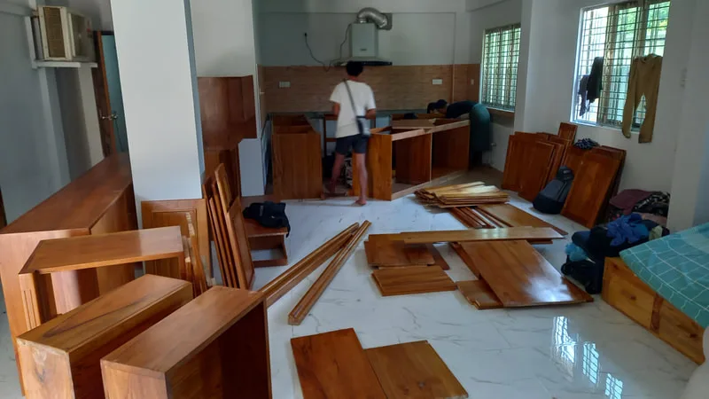 Wooden furniture panels and shelving ready for assembly