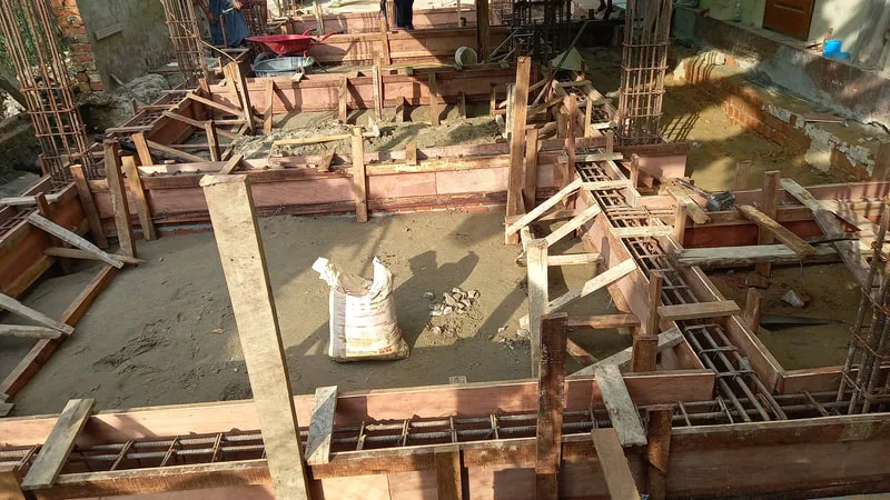 Formwork arranged around foundation trenches