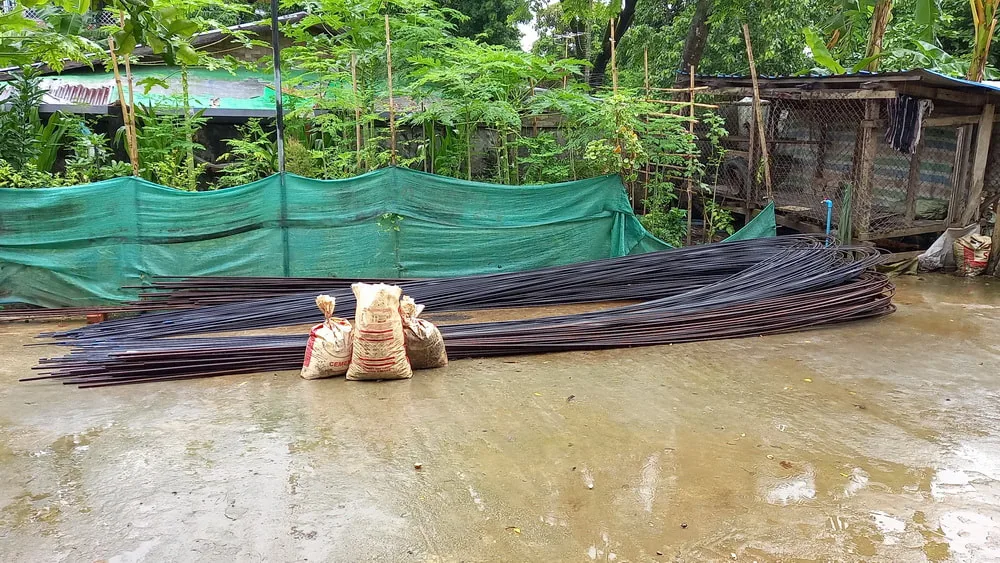 Steel reinforcing rods and cement bags