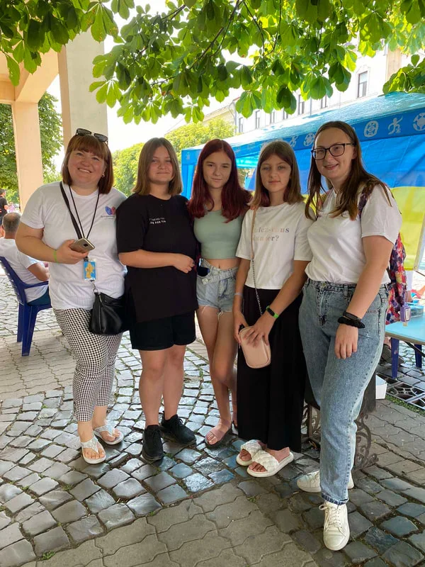 Group standing together outdoors