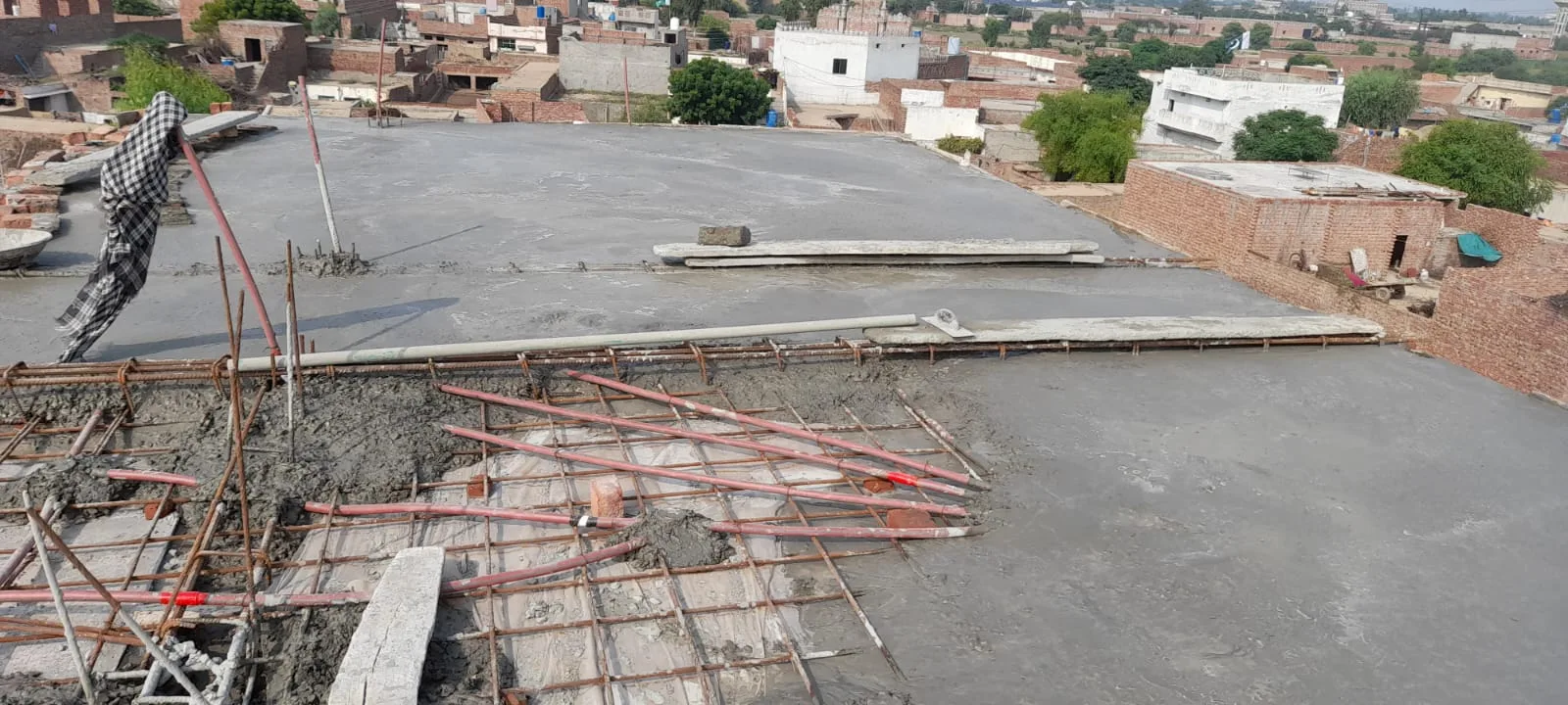 Roof slab partially covered with fresh concrete