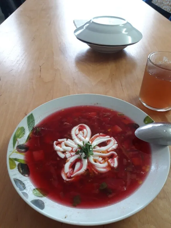 Bowl of borscht on a table