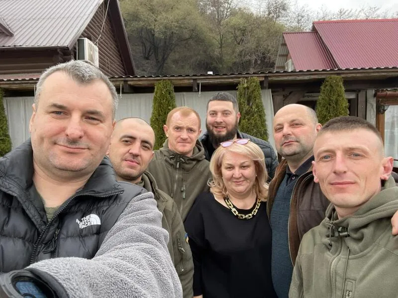 Group standing together outdoors