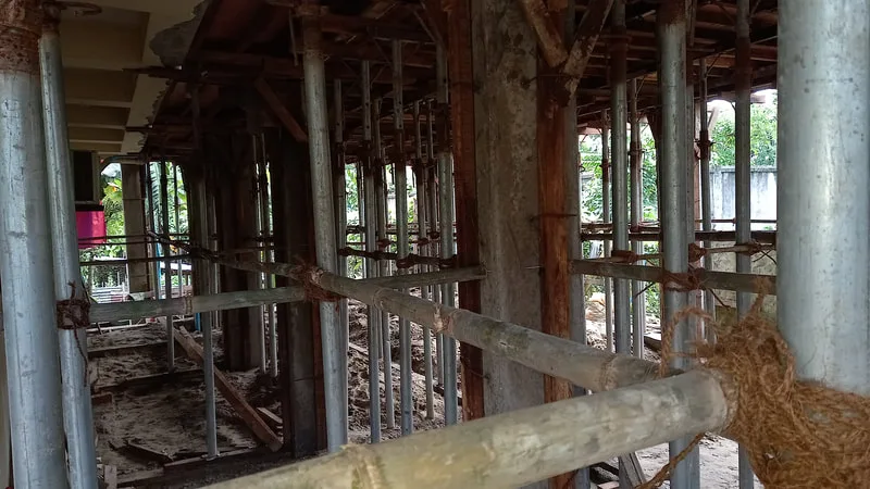 Rows of temporary supports inside a building