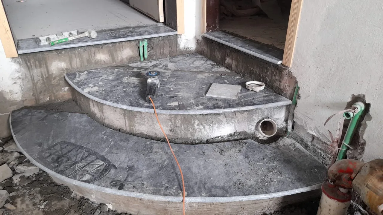 Curved stone steps under construction