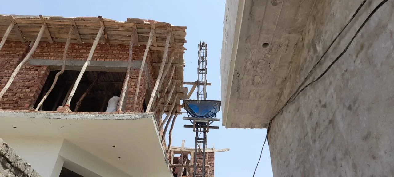 Scaffolding beneath an unfinished upper floor
