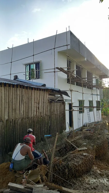 Exterior of a newly painted two-story building