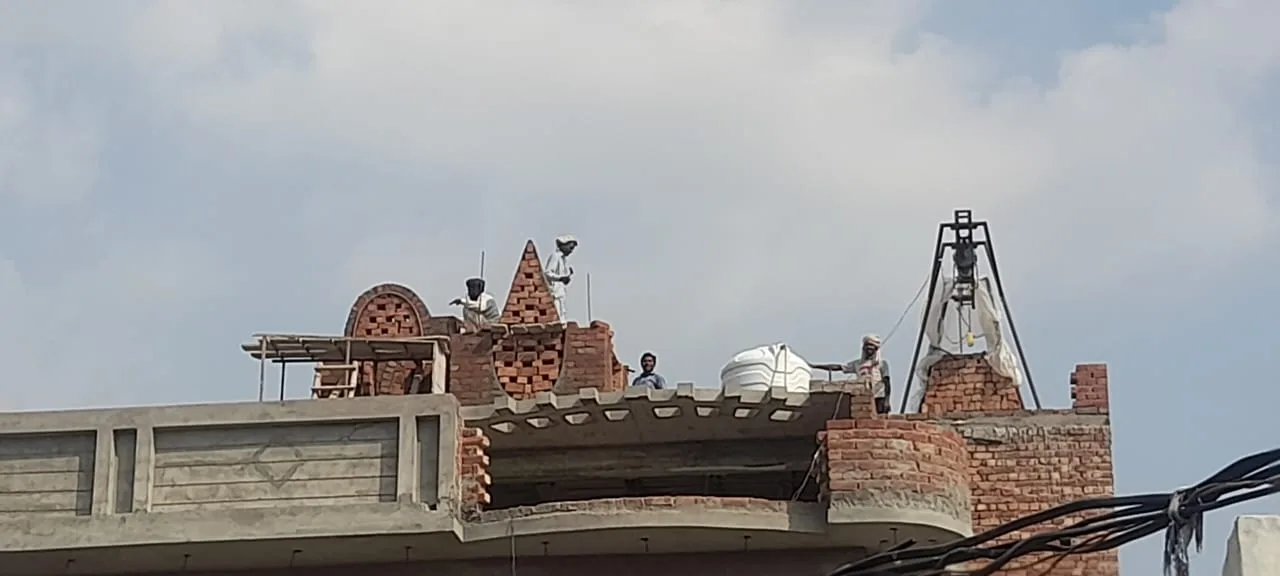 College roof with decorative brickwork