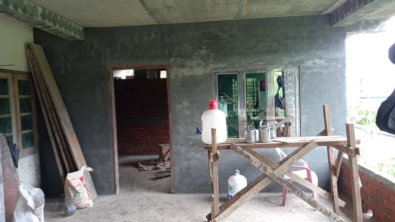 Unfinished room with plastered walls