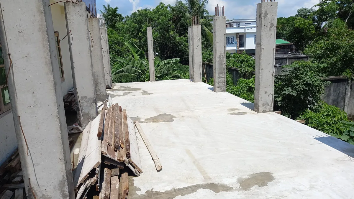 New concrete columns on an upper floor