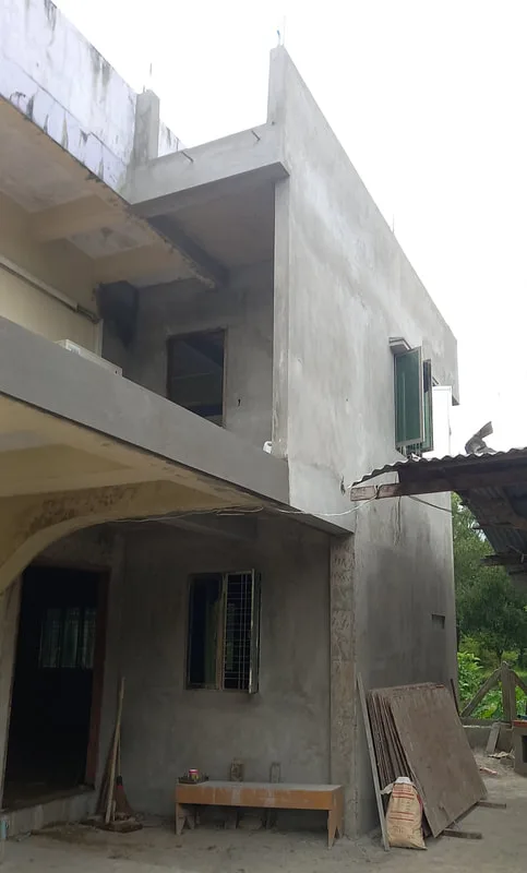Exterior of a newly plastered concrete building