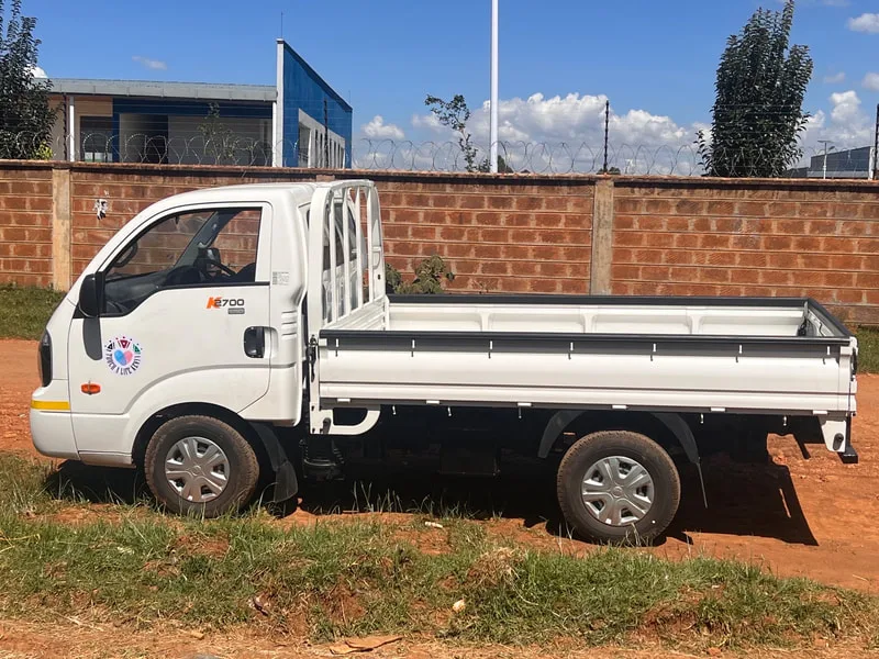 White flatbed delivery truck