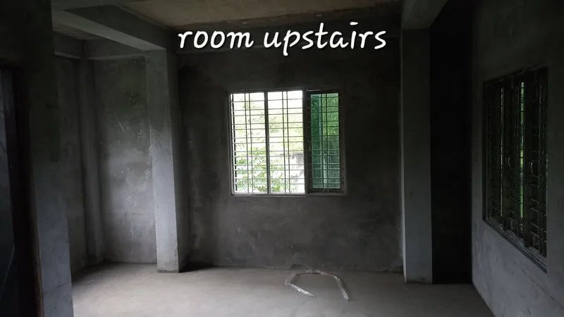 Upstairs room with windows and doorways