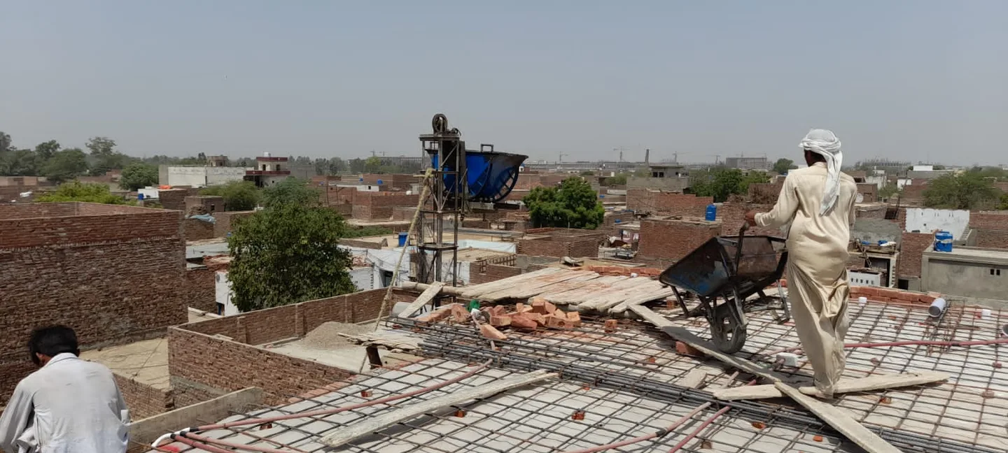 Workers preparing a reinforced roof slab