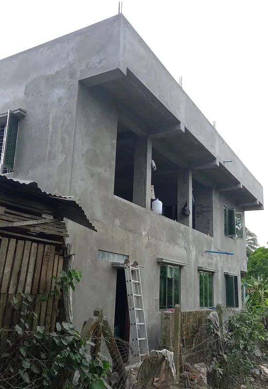 Two-story concrete building under construction