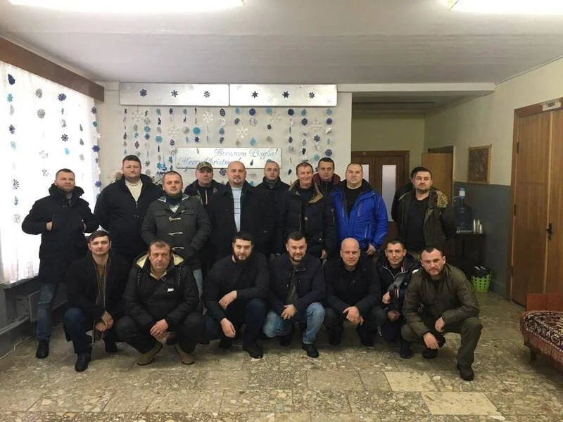 Group gathered inside a meeting room