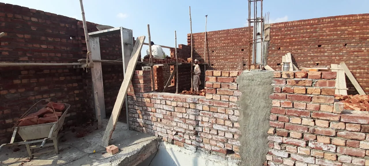 Brick walls and doorway under construction