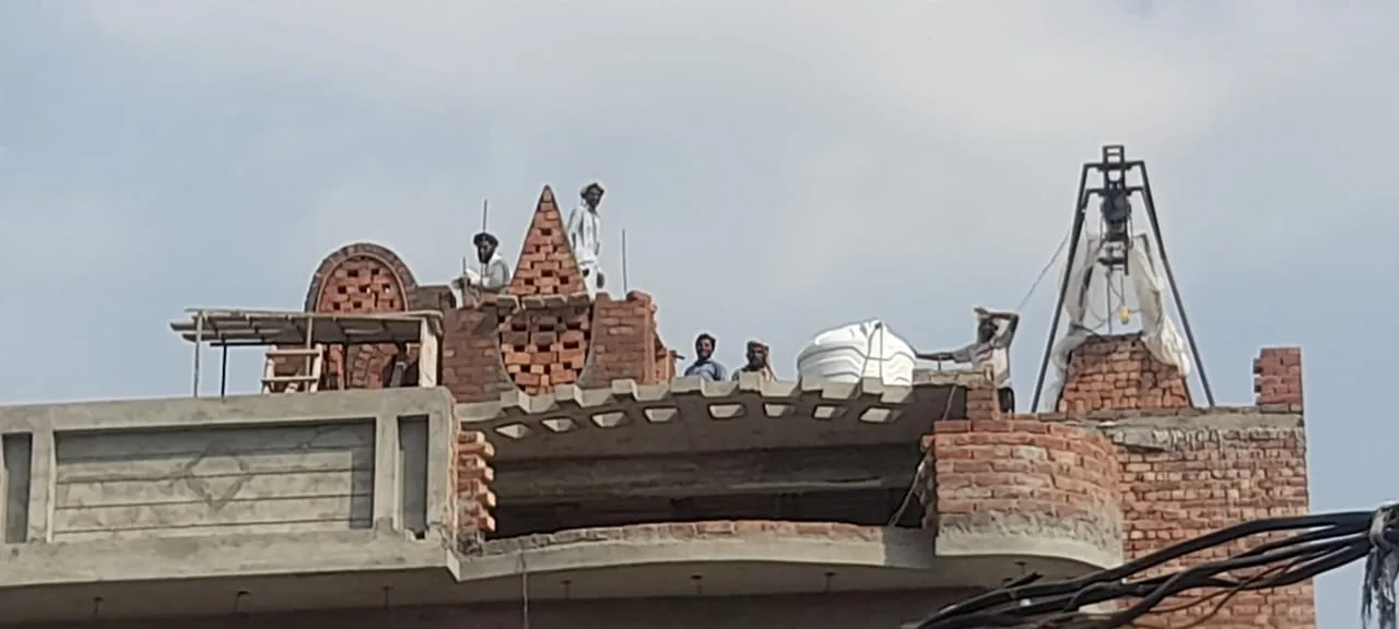 Decorative brick arches above the college roof