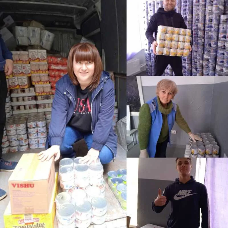 People distributing packaged food supplies
