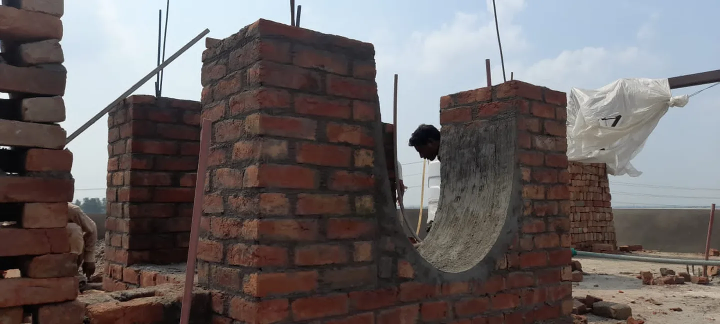 Unfinished decorative brick arch