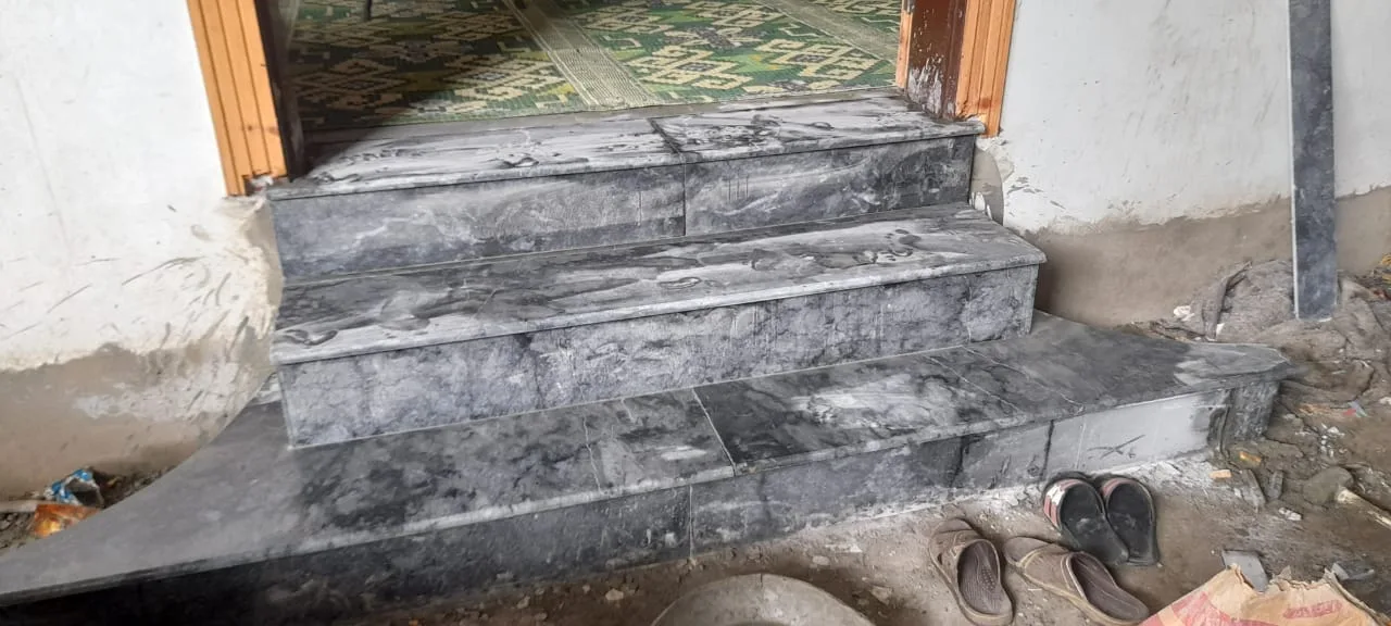 Stone entrance steps under construction