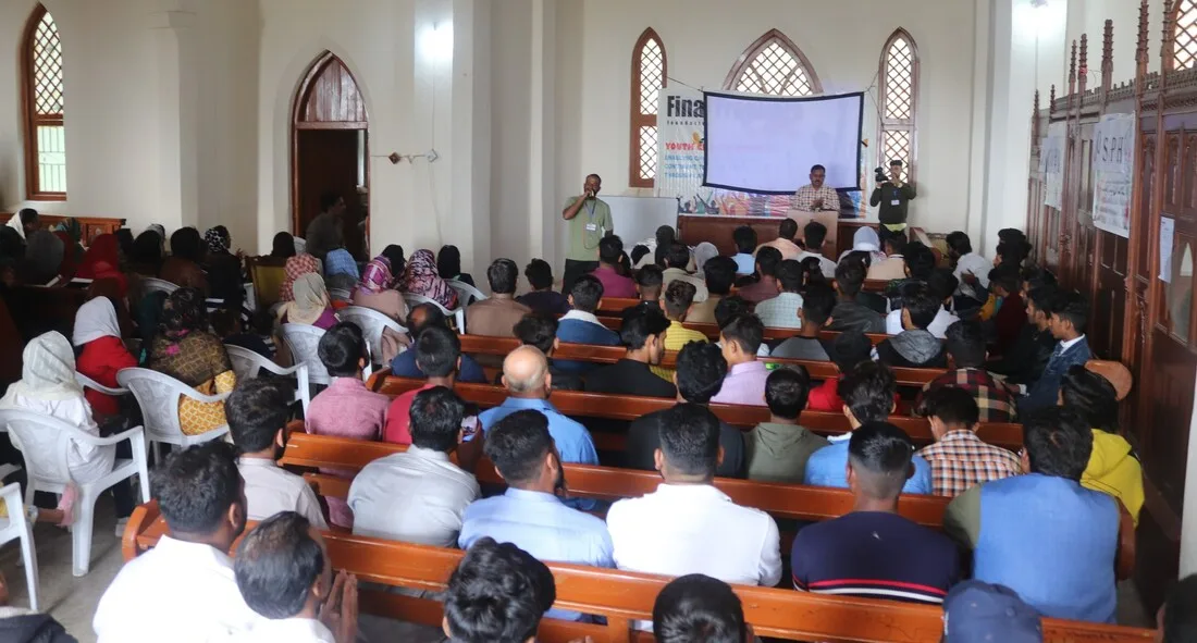 Congregation seated inside a church