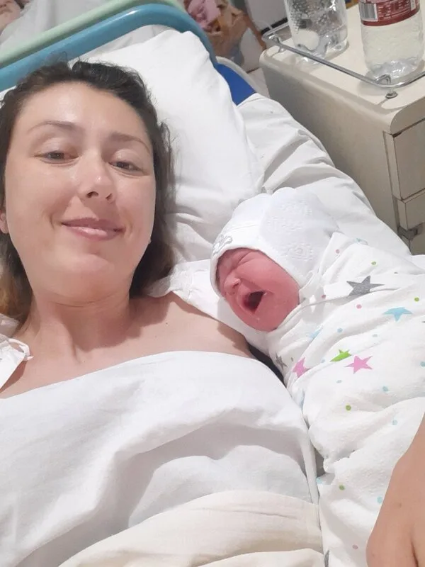 Mother holding a newborn baby