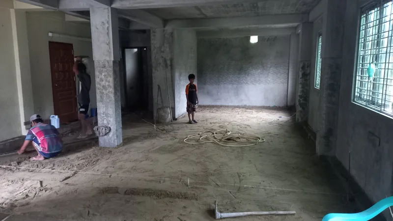 Unfinished interior with newly plastered walls