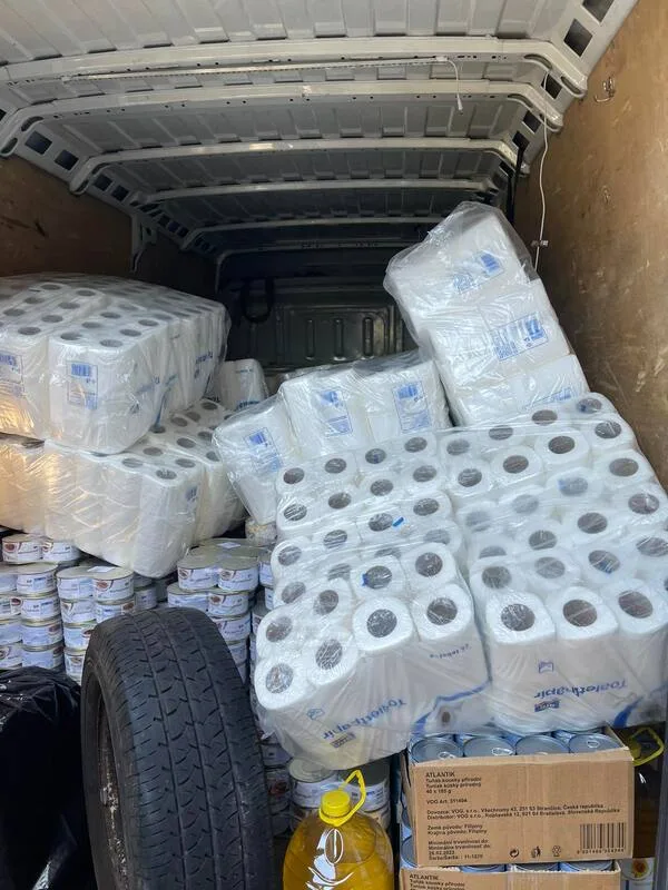Van loaded with household and food supplies