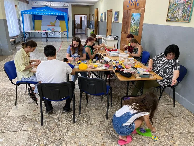 People sharing a meal at a table indoors
